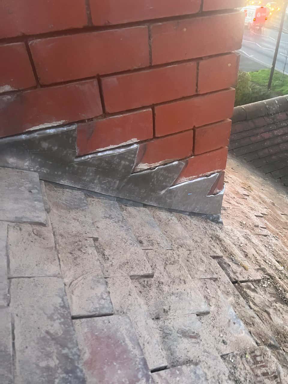 This is a photo of new leadwork being installed around an old chimney. Works carried out by Fareham Roofing Repairs